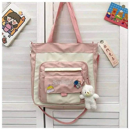 Waterproof Nylon Shoulder Bag – Canvas Tote with Multiple Front Pockets & Cute Doll