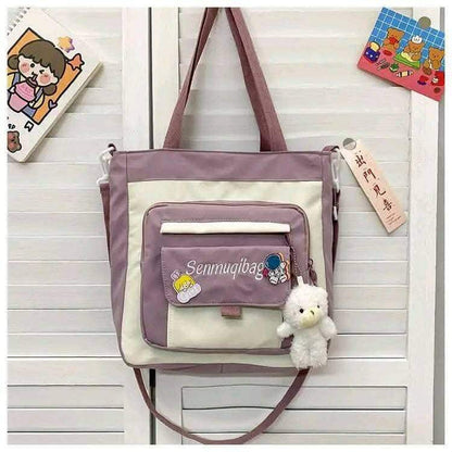 Waterproof Nylon Shoulder Bag – Canvas Tote with Multiple Front Pockets & Cute Doll
